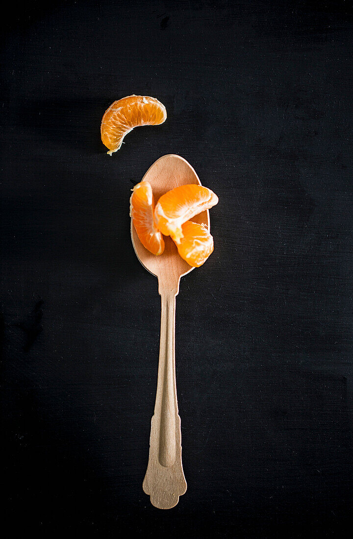 Spoon with orange slices