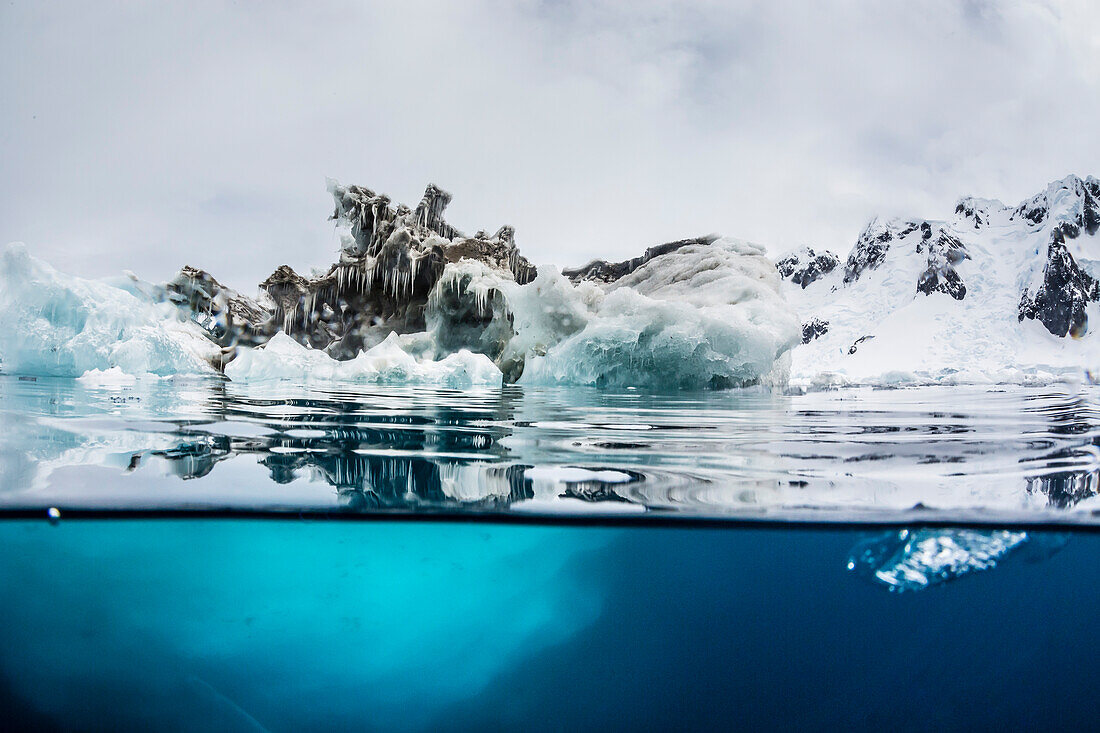 Above and below water view of iceberg at Booth Island, Antarctica, Polar Regions