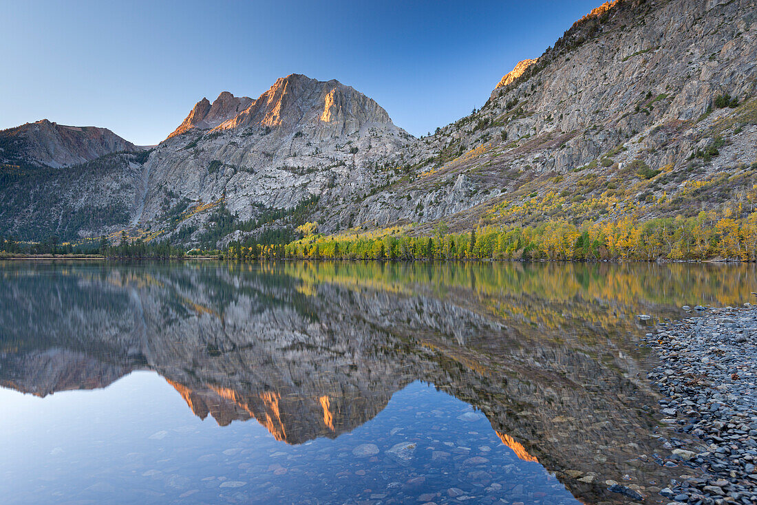 Carson Peak reflected in Silver Lake at dawn, June Lake Loop, California, United States of America, North America
