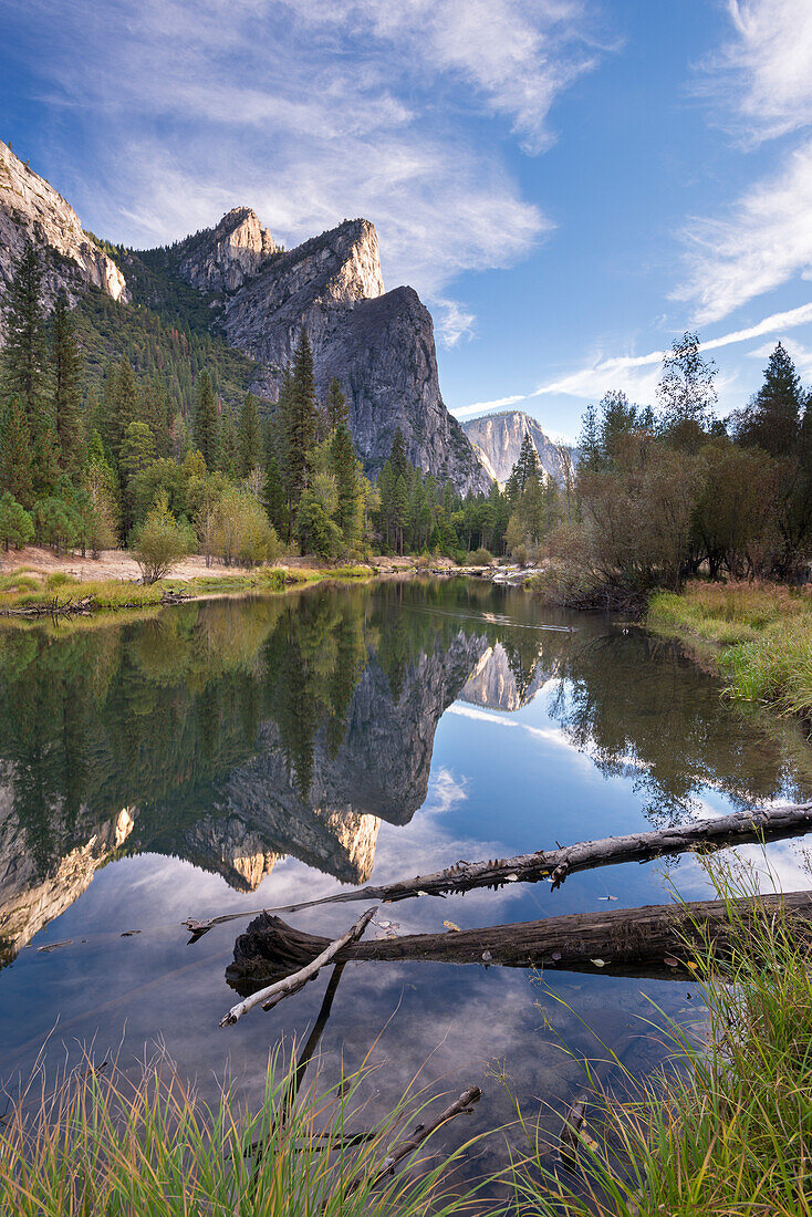 The Three Brothers mountains reflected in the tranquil waters of the River Merced, Yosemite National Park, UNESCO World Heritage Site, California, United States of America, North America