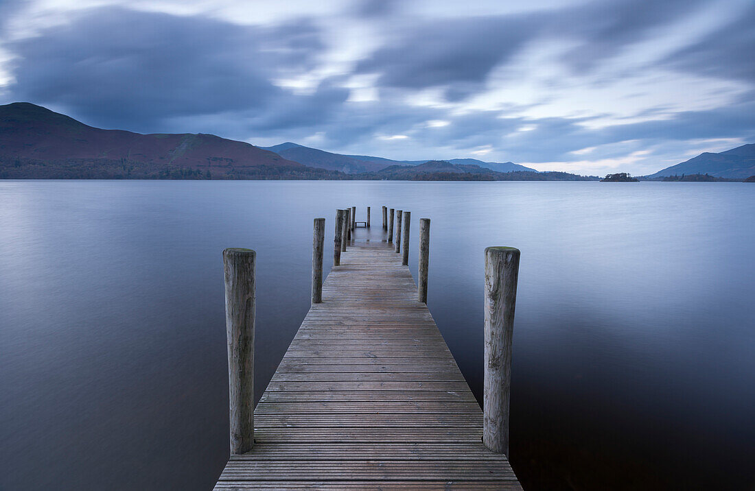 Wooden jetty on Derwent Water in autumn, Lake District National Park, Cumbria, England, United Kingdom, Europe