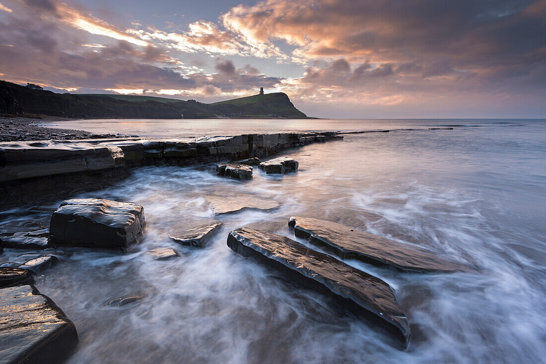 Winter sunrise over Clavell Tower from Kimmeridge Bay on the Jurassic Coast, UNESCO World Heritage Site, Dorset, England, United Kingdom, Europe