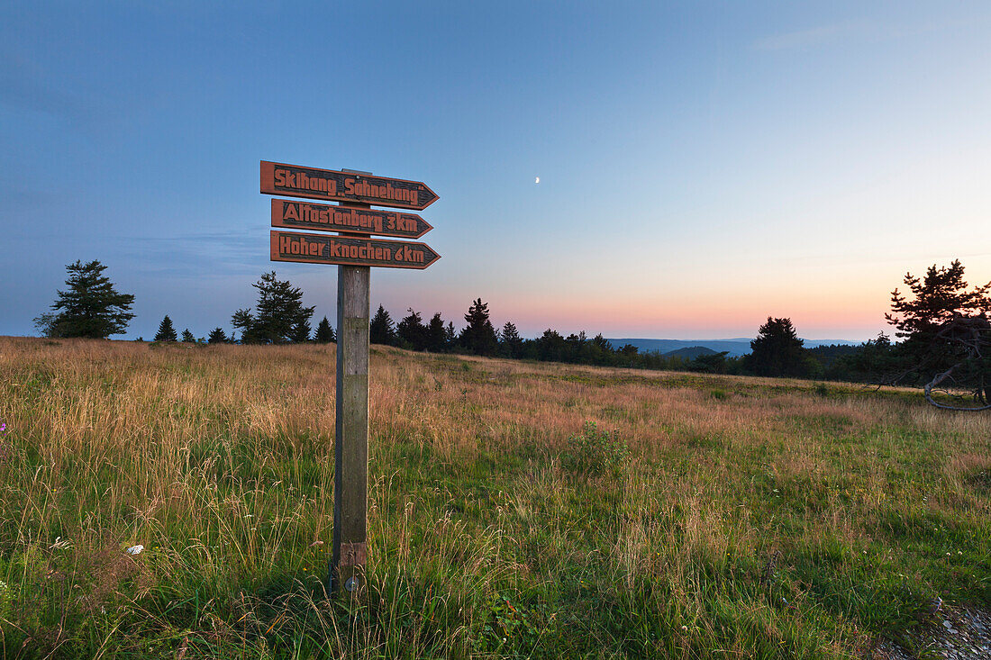Signpost at Kahlen Asten hill, near Winterberg, Rothaarsteig hiking trail, Rothaargebirge, Sauerland region, North Rhine-Westphalia, Germany