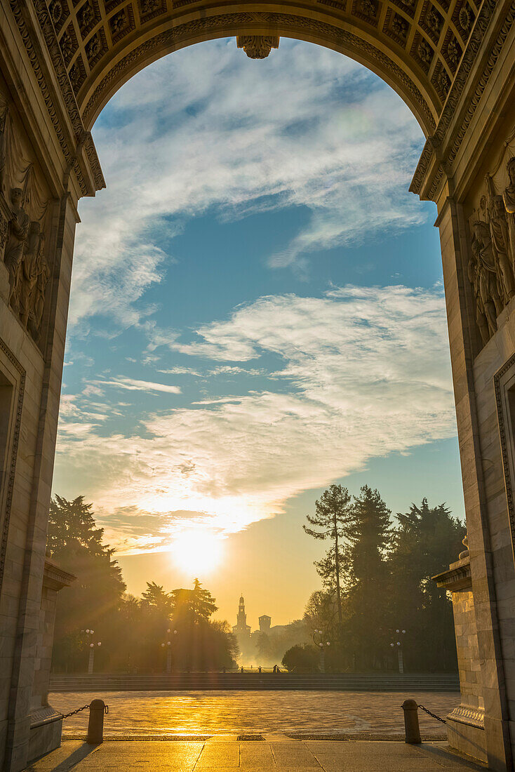 Simplon Gate with Arco della pace at sunset, Milan, Lombardy, Italy