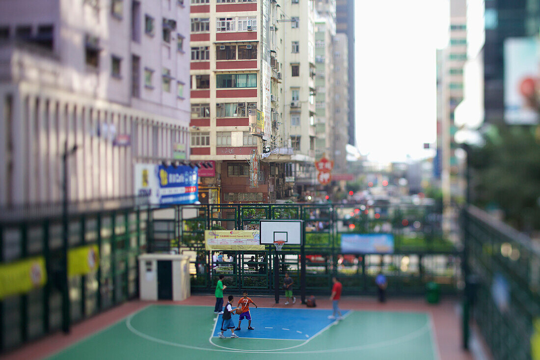 An outdoor basketball court in an urban area, Hong Kong