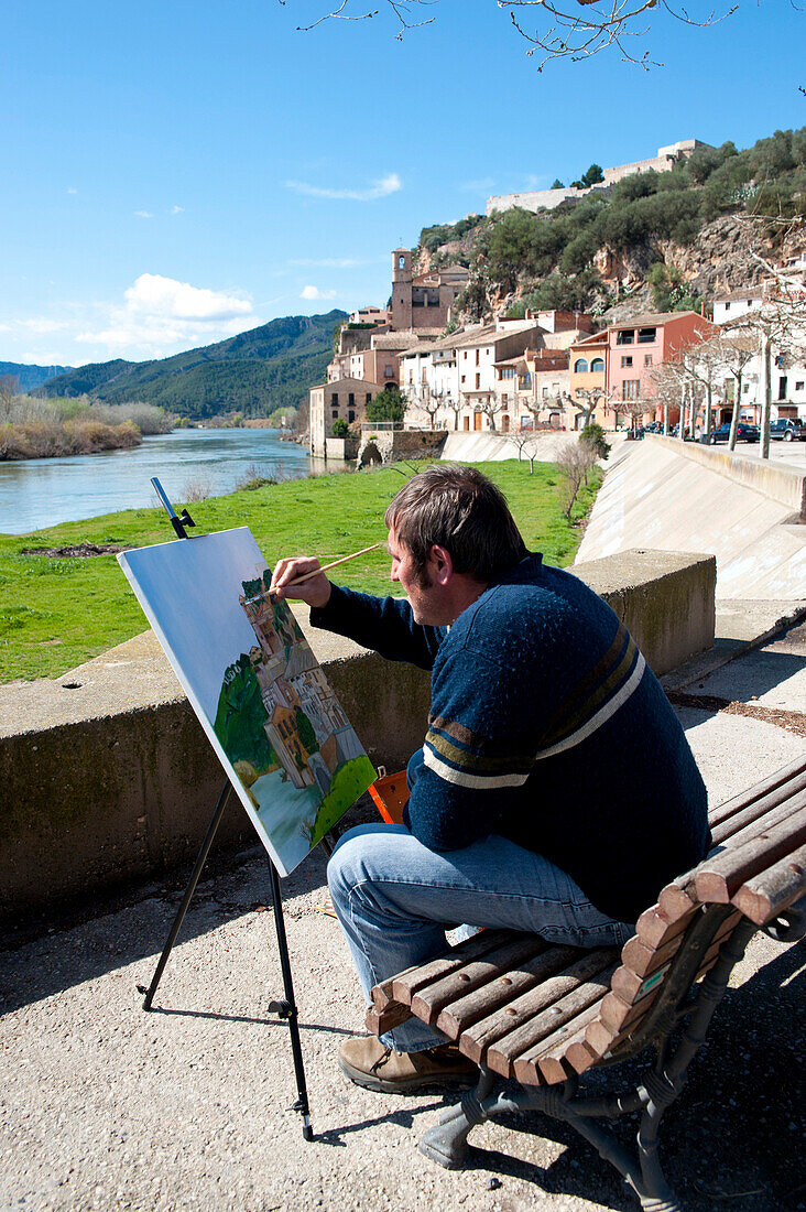 Artist Painting The Views Of Miravet, Ebro River And Castle, Miravet, Tarragona, Spain
