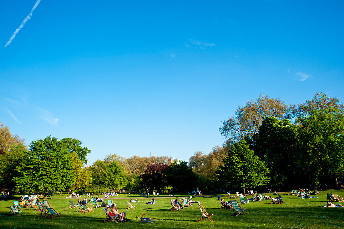 People Sunbathing On A Spring Day In Green Park, Central London, London, Uk