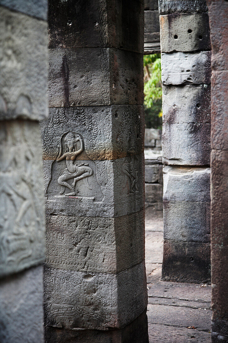 Pillars with Apsara dancers at Angkor Wat Temple Cambodia