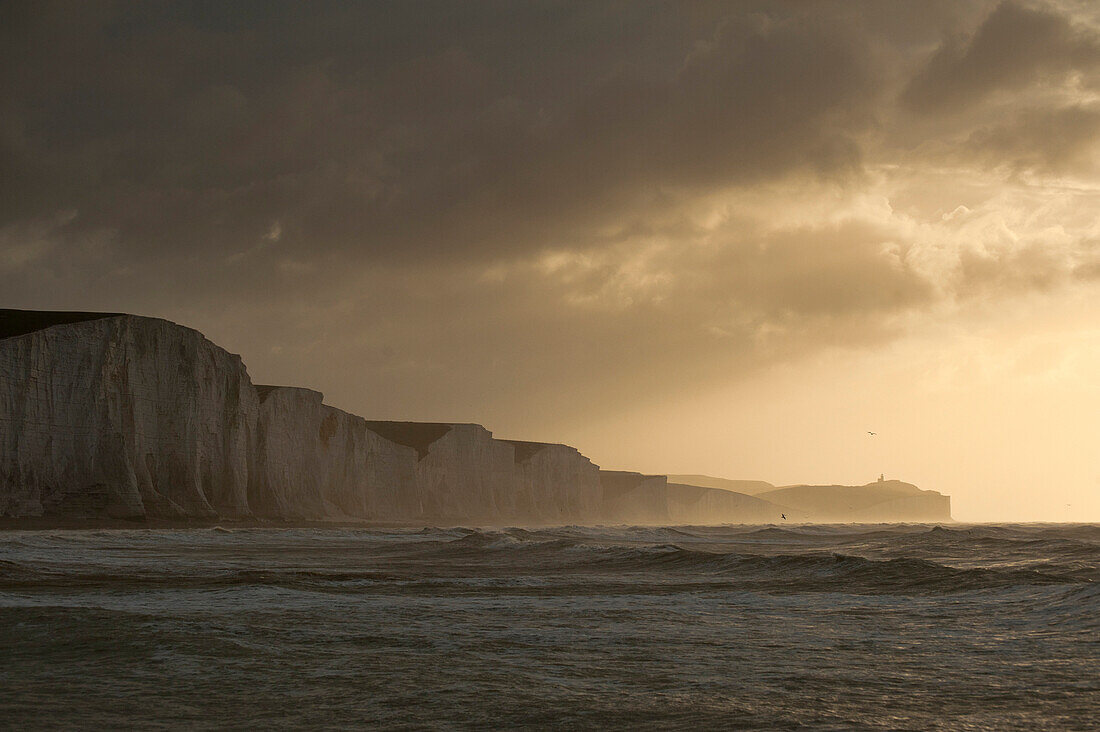 Cliffs of the Seven Sisters Country Park at dawn on stormy day, East Sussex, England