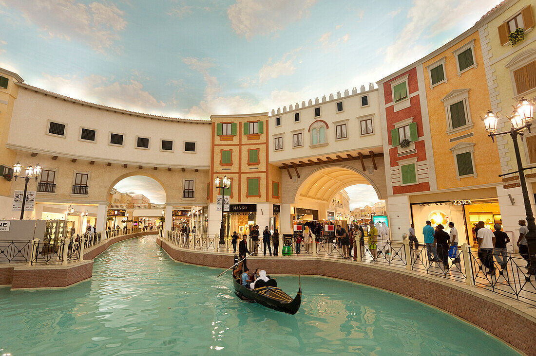 Electric gondola on canal in the Villagio shopping mall, Doha, Qatar