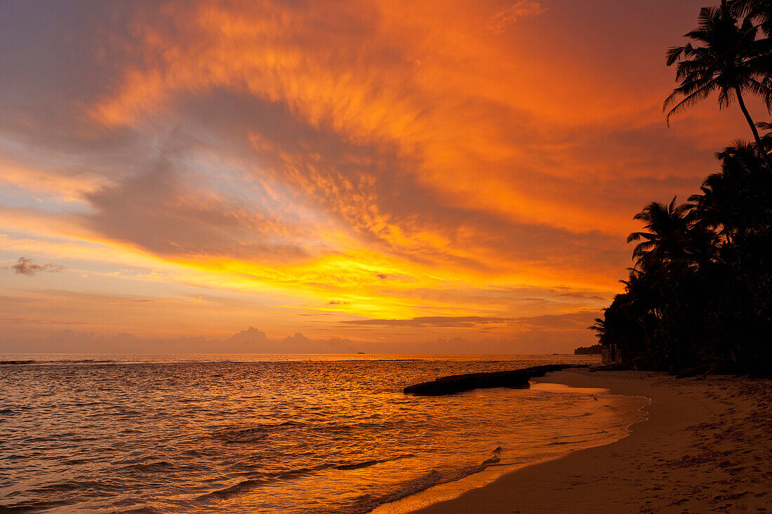 Sunset on beach, near Unawatuna, Thalpe, Sri Lanka