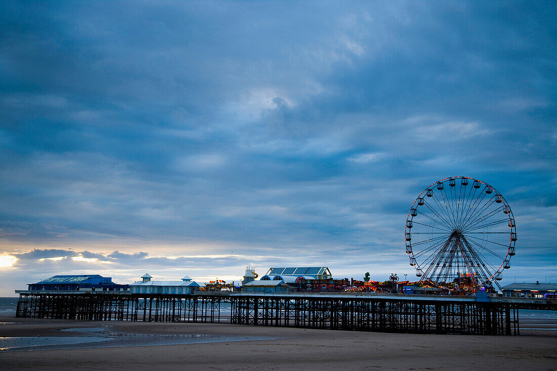 Blackpool central pier reaches out into the sea, Blackpool Pleasure beach, Blackpool, Lancashire, England