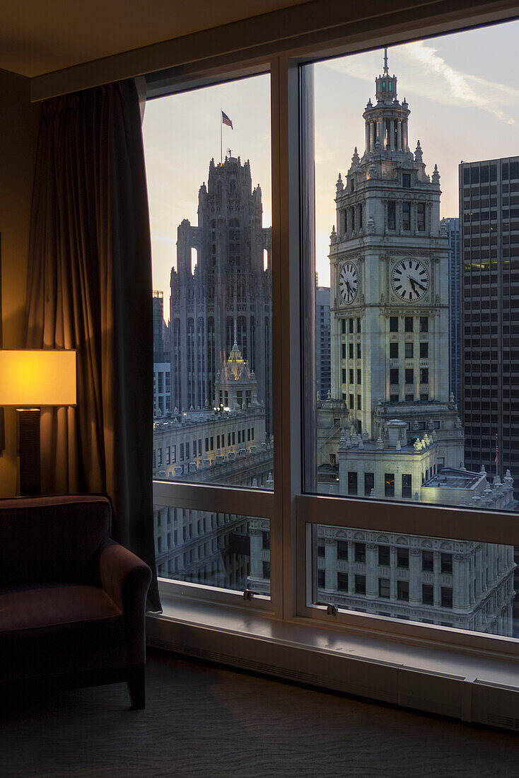 'View of Wrigley Building and Tribune Tower (with flag) from 20th-floor bedroom at Trump International Hotel and Tower; Chicago, Illinois, United States of America'
