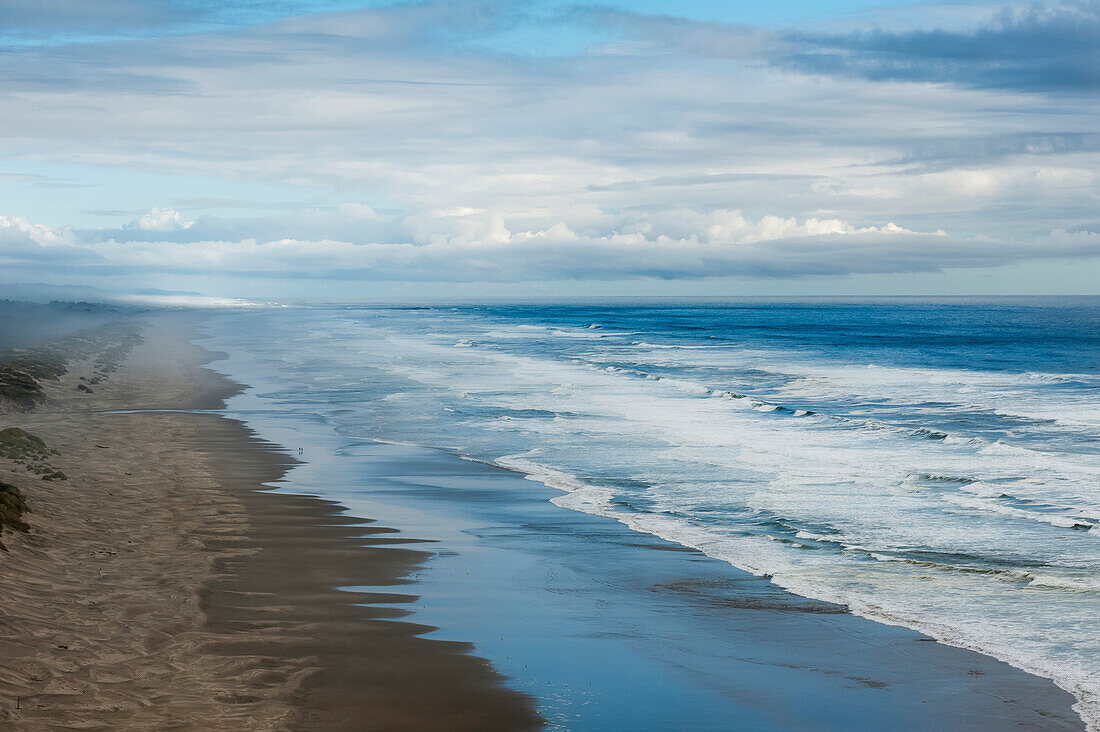 'Waves crashing along a beach; Oregon, United States of America'