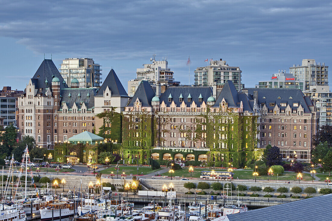'The Fairmont Empress hotel sits majestically at the cornerstone of Inner Harbour; Victoria, Vancouver Island, Canada'