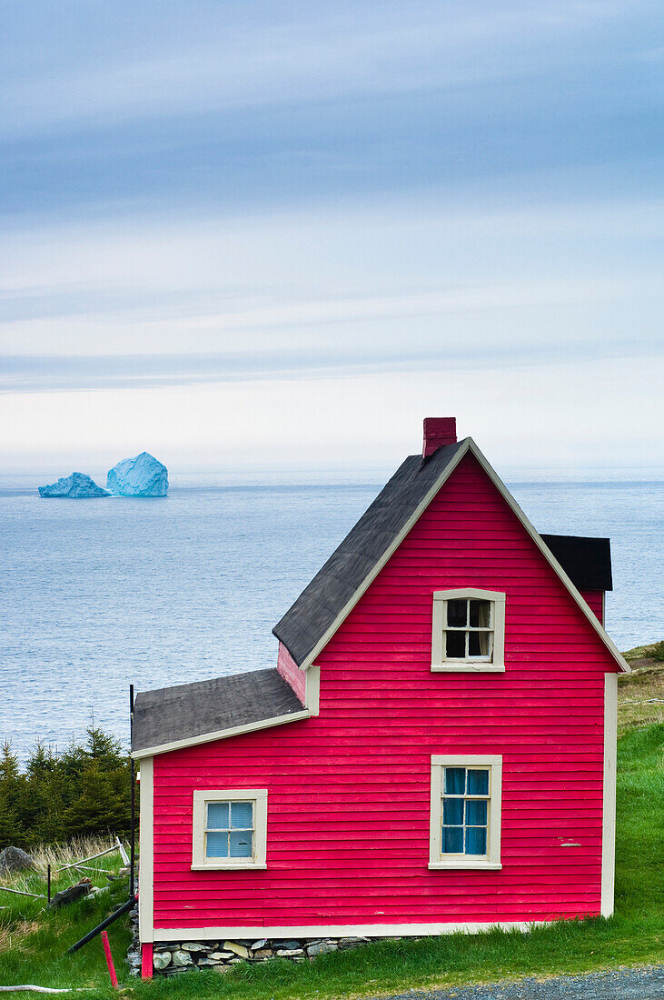 Red Cabin With Icebergs In The Background, Newfoundland