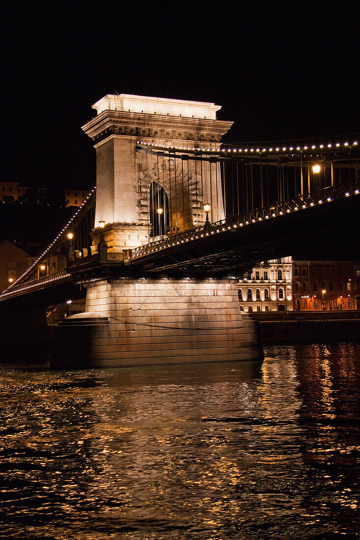 Szechenyi Chain Bridge Over The Danube River At Night, Budapest, Hungary