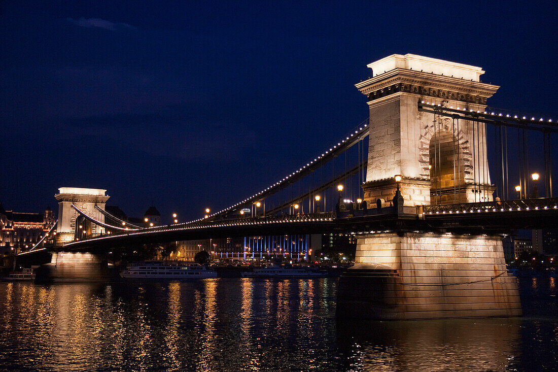 Szechenyi Chain Bridge Over The Danube River At Night, Budapest, Hungary