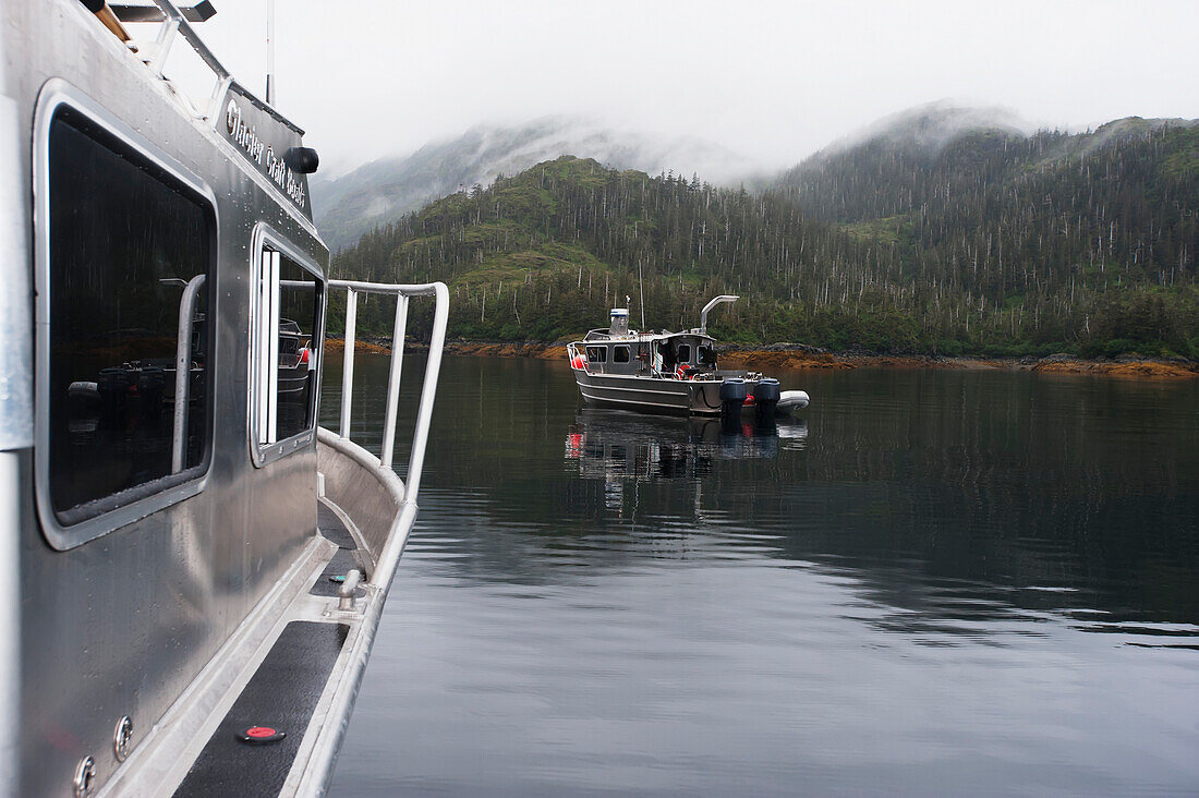 Aluminum boats anchored off Knight Island, Prince William Sound, Southcentral Alaska