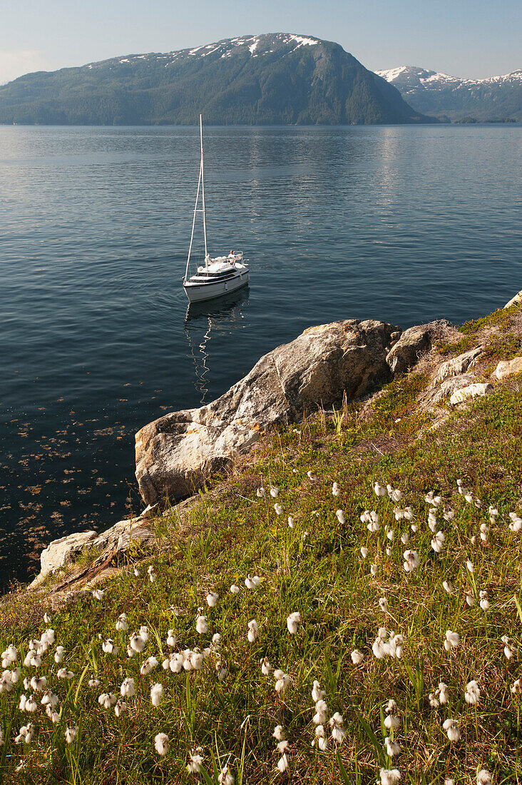 Sailboat anchored along the coastline of Prince William Sound, Southcentral Alaska.