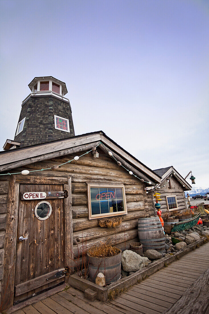 The exterior of historic Salty Dawg Saloon on Homer Spit, Homer, Southcentral Alaska, Spring.