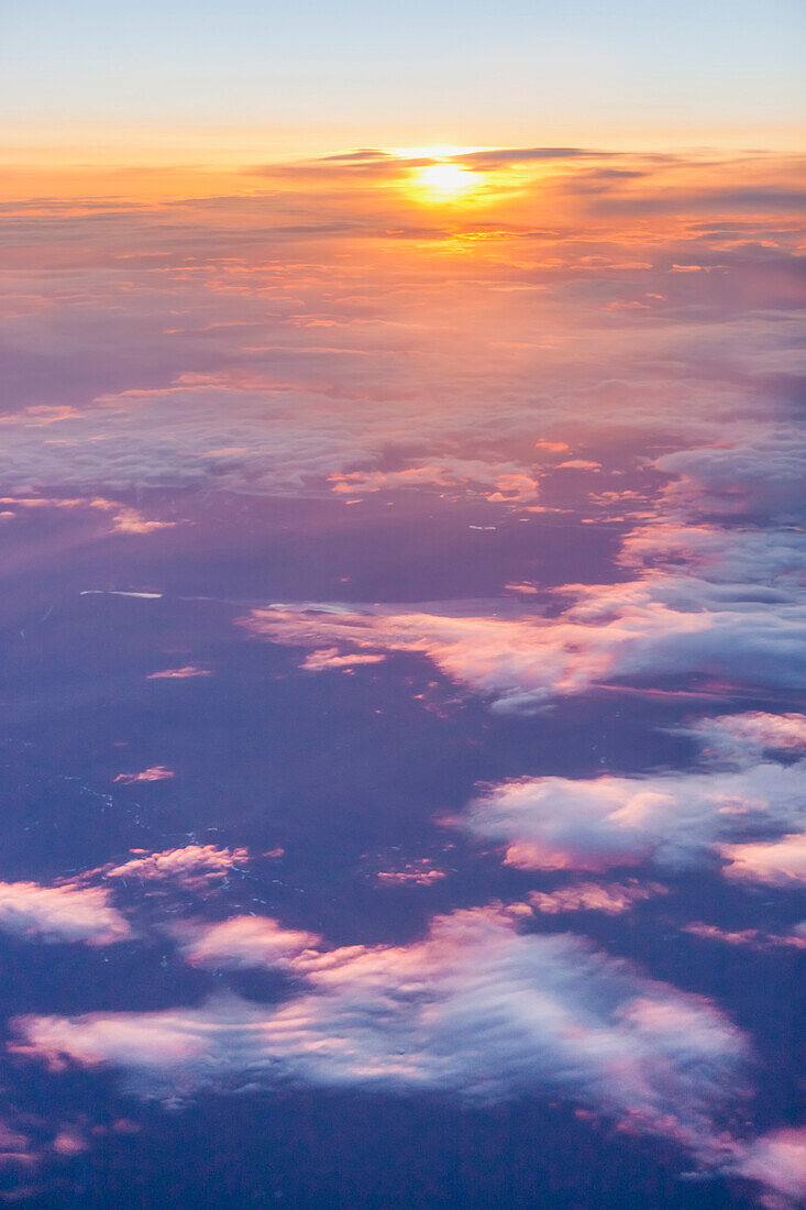Aerial view of a partly cloudy sunrise in Arctic Alaska, summer