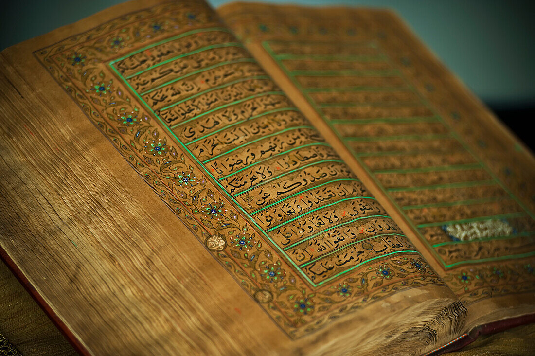 Intricate text of an old Koran at Brunei's Dar al-Salam's Islamic Museum, Bandar Seri Begawan, Brunei
