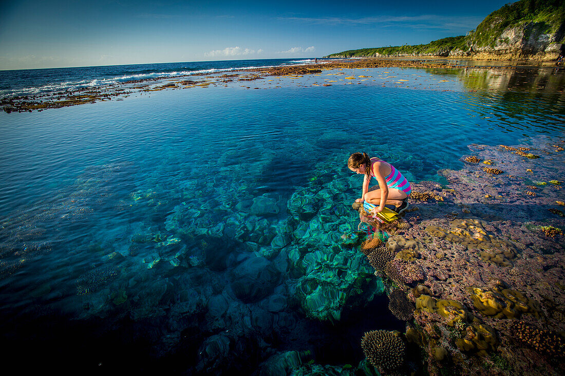 Exploring the reef that rings Niue Island, Niue