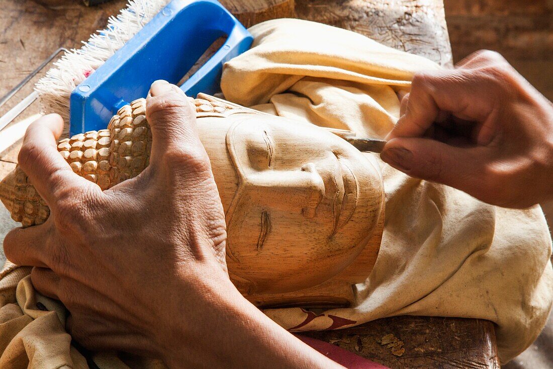 Cambodia,Siem Reap,Artisans Angkor Workshop,Carving Buddha Head