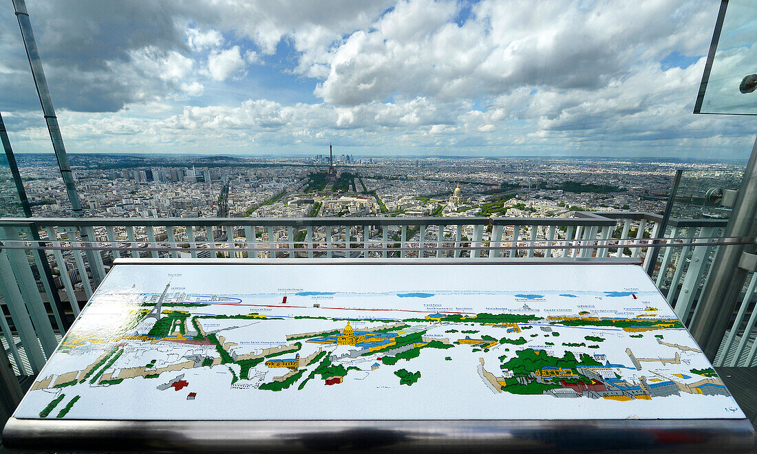 Europe, France, Paris aerial view from the terrace of the Montparnasse Tower, Orientation table in  foreground, the Eiffel Tower in background