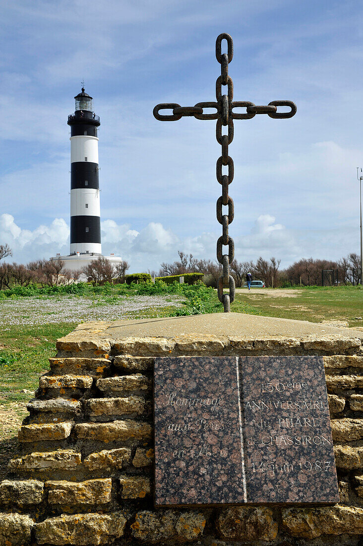 France, Charente Maritime, Oleron Island, Saint-Denis d'Oleron, plaque and cross in memory of dead sailors at sea before Chassiron lighthouse at the tip of the island