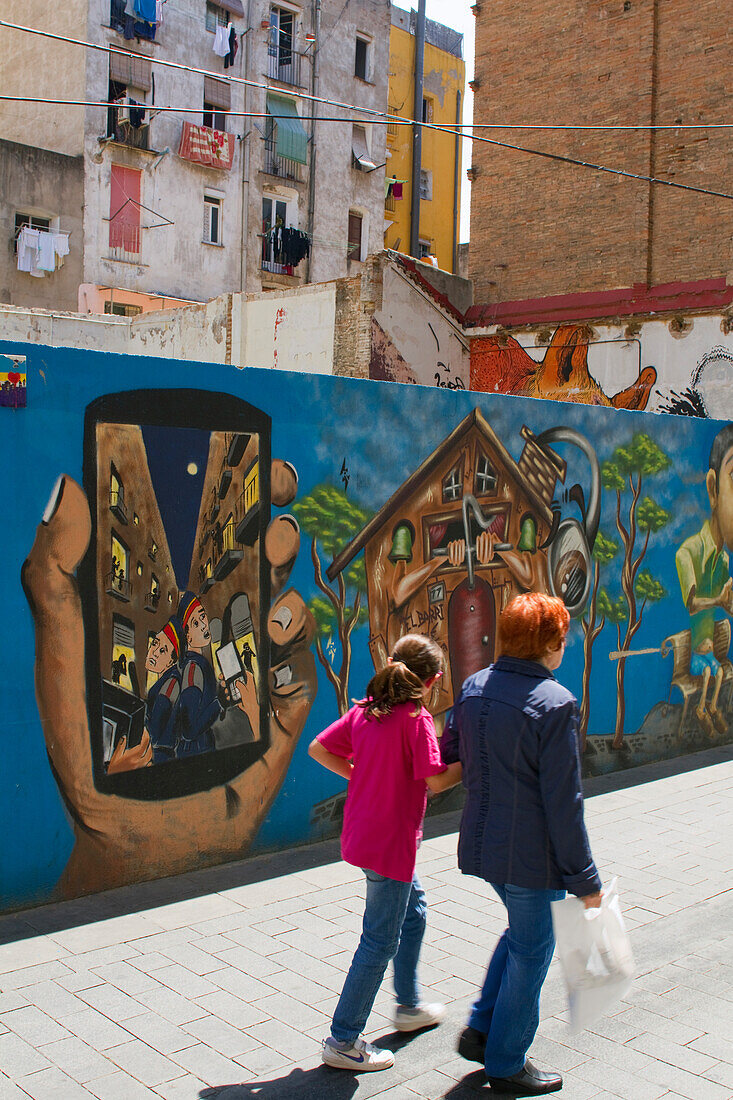 Spain, Catalonia, Barcelona, El Raval area, Carrer de l'Aurora, painting on a fence, May 2014