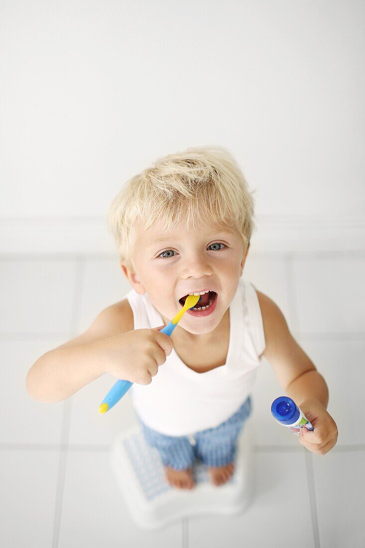 Little boy brushing his teeth