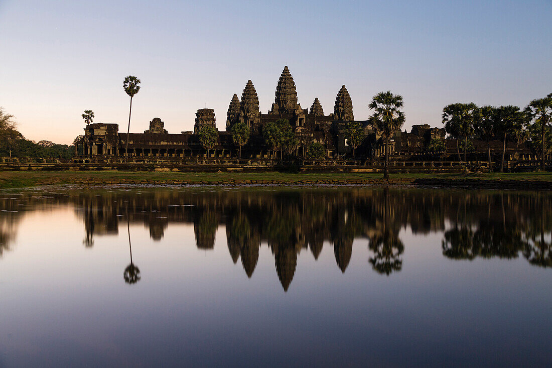 Temple reflecting in still lake, Siem Reap, Siem Reap, Cambodia