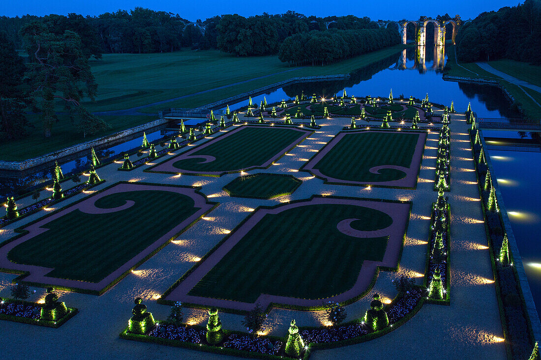 illumination at nightfall of the french-style gardens by andre le notre, chateau de maintenon, eure-et-loir (28), france