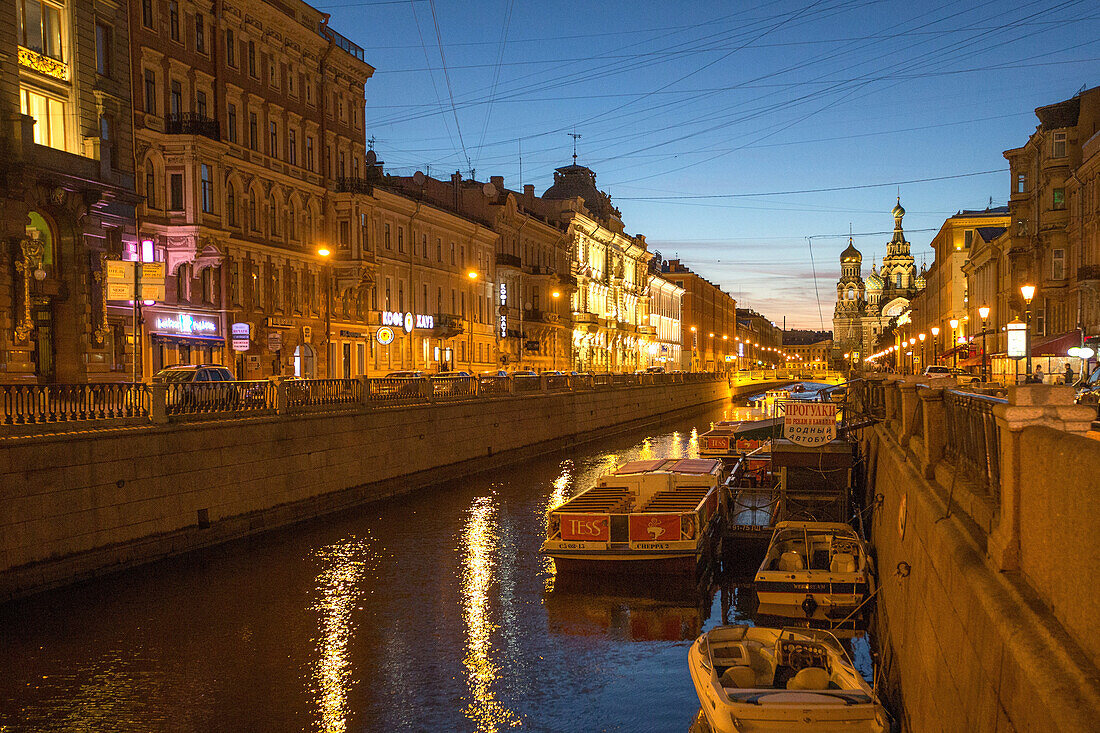 boat on the griboedov canal, church of the savior, night ambiance, saint petersburg, russia