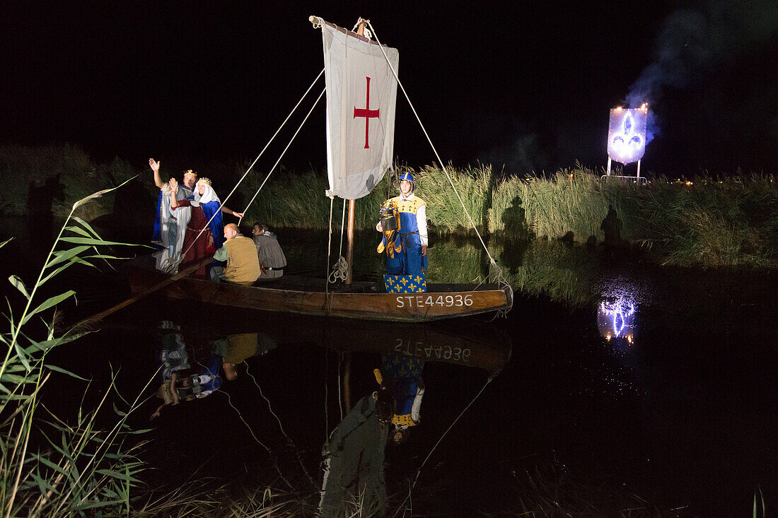 festival of saint louis, the ramparts, actors playing louis ix and the queen re-enact the departure for the crusades on a boat on the encircling canal, pyrosymphonic performance, medieval festival, celebration of the 800 year anniversary of the birth of l