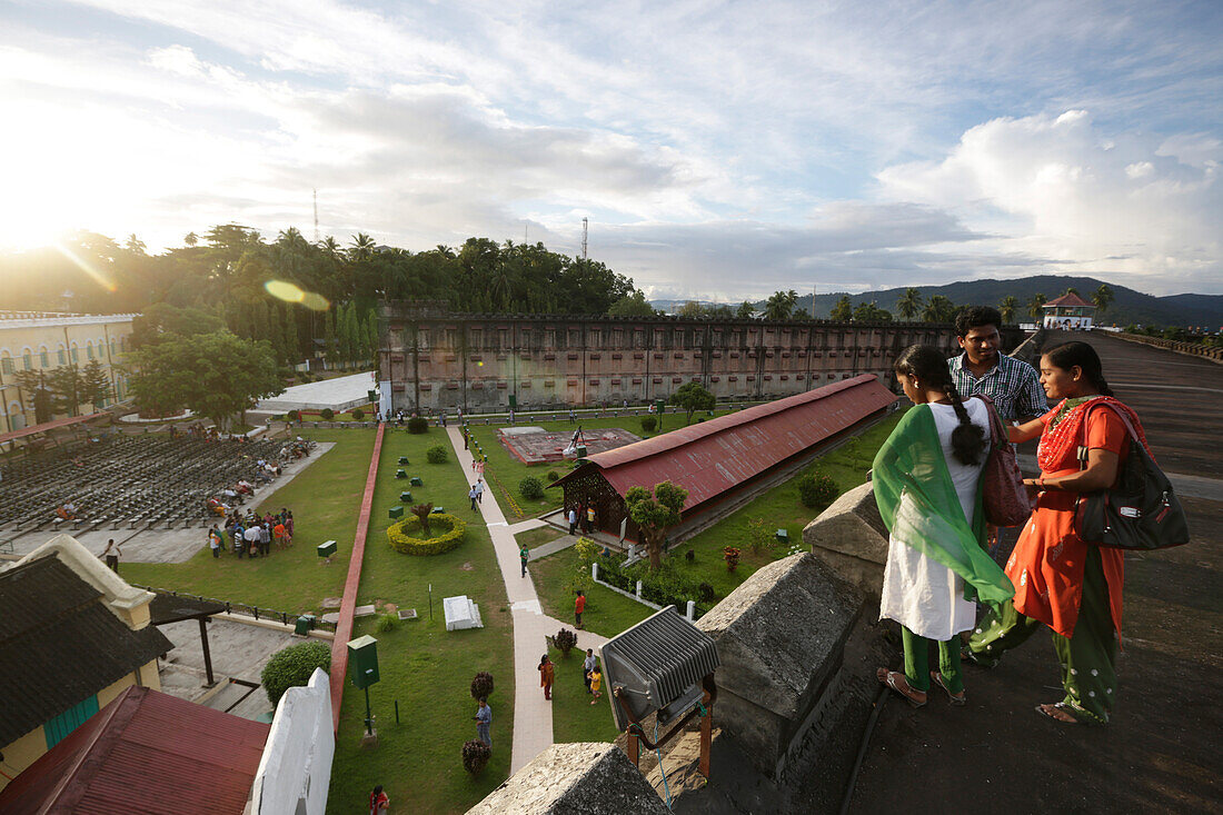 Cellular Jail, National Monument, visitors on top of a building wing overlooking the courtyard of the Colonial prison, Port Blair, South Andaman, Andaman Islands, India