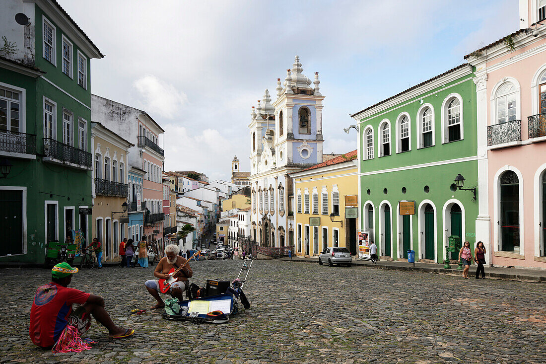 Largo do Pelourinho, the most famous square of the Old Town, blue church Nostra Senora do Rosario dos Homens Preto, in the back Igreija / Convento do Carmo, historic center, Pelourinho, Salvador de Bahia, Bahia, Brazil