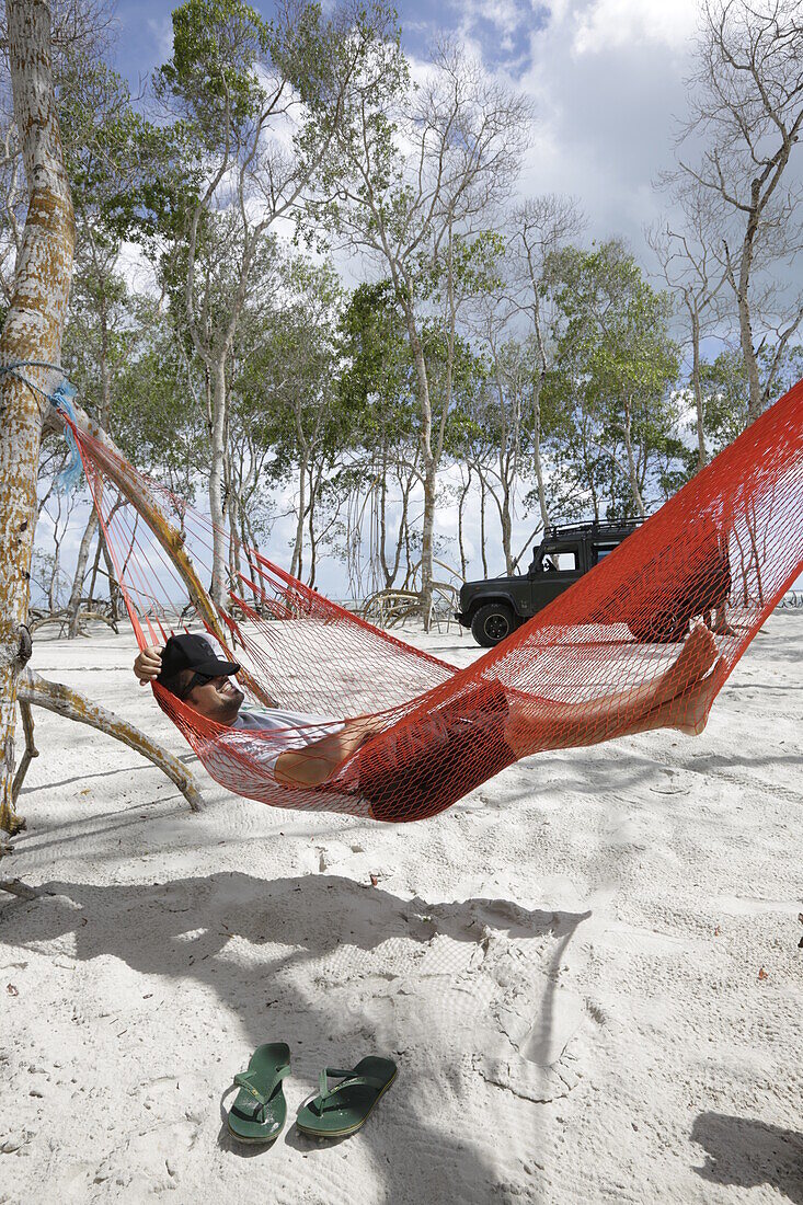 Hammocks for tourists, ride with 4WD with guide Paulo Extremo Nordeste Xpeditions, mangrove forest, road on the beach near the village of Vila do Pescadores, west Jericoacoara, Ceara, Brazil