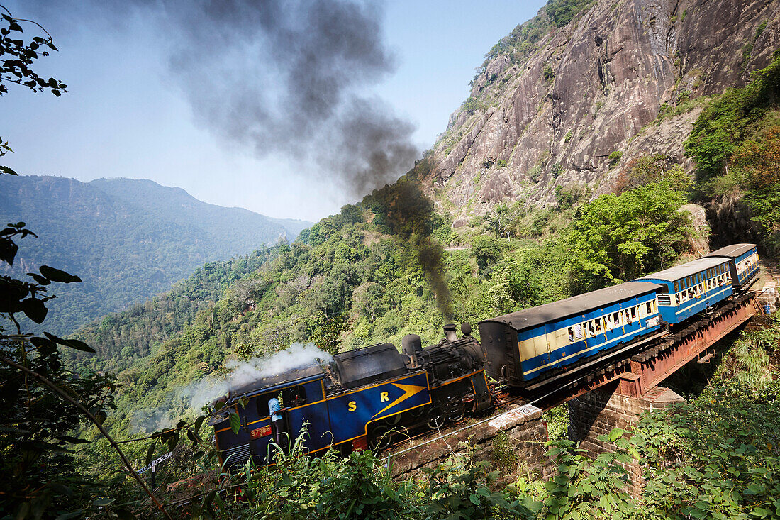 Diesel locomotive of the Nilgiri Mountain Railway, Steilstrecke, cog wheel technology, about 1,000m above sea level, travelling from Mettupalayam in the morning, to Conoor, Nilgiri Hills, Western Ghats, Tamil Nadu, India