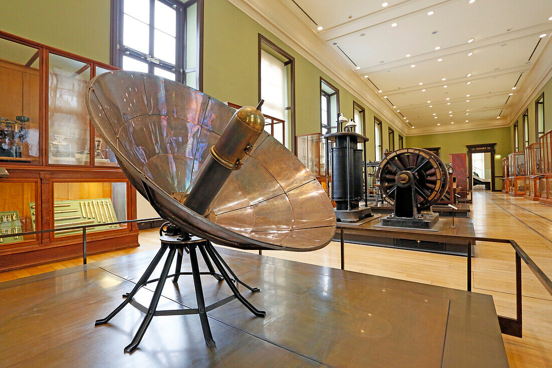 France,Paris, 3rd district, Museum of Arts and Crafts, Energy Collection, In the left foreground a solar oven dating from the late 19th century