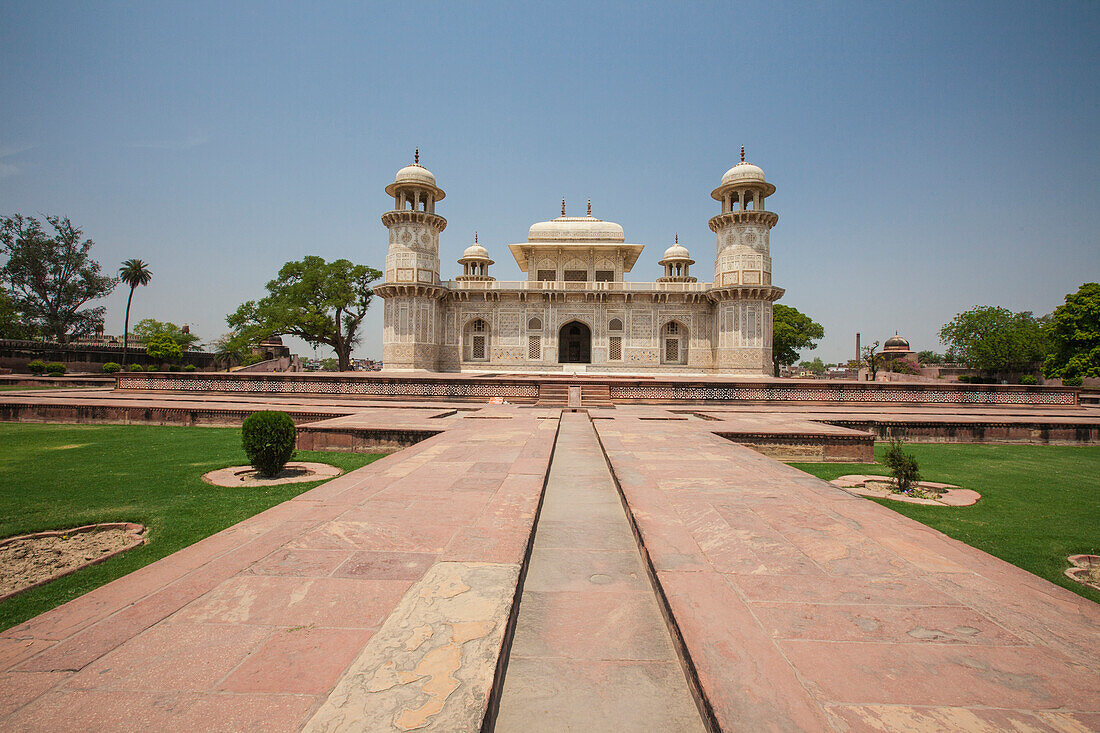 A footpath leads to the sandstone mausoleum of the Moghul Emperor Humayun which has been restored after a period of neglect, Delhi, India, Asia