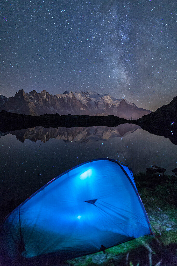 Camping with a tent under the Milky Way at Lac des Cheserys, looking at Mont Blanc, Haute Savoie, French Alps, France, Europe