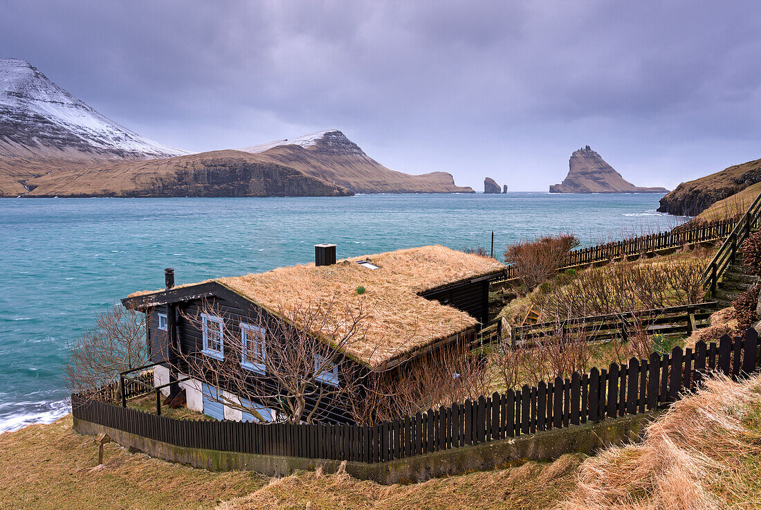 Grass roofed house in the village of Bour on the island of Vagar, Faroe Islands, Denmark, Europe