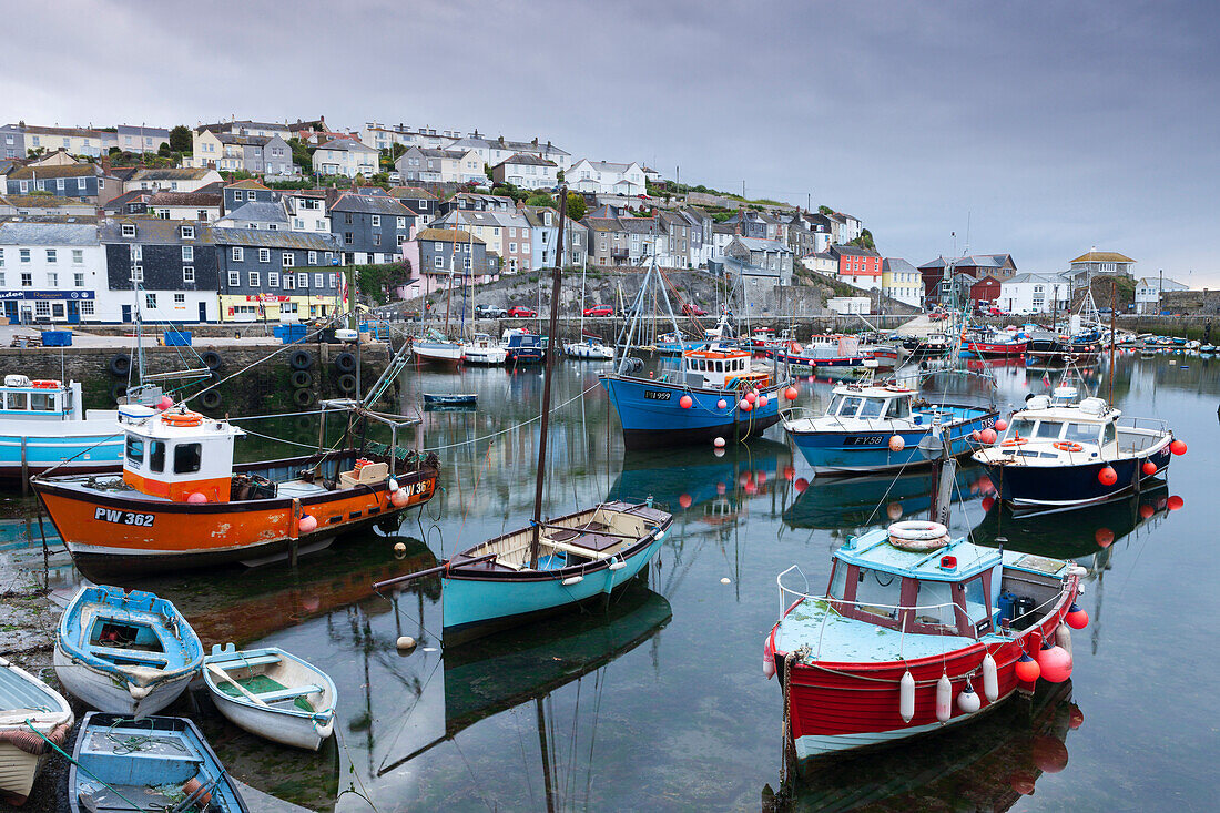 Fishing boats moored in pretty Mevagissey harbour, Cornwall, England, United Kingdom, Europe