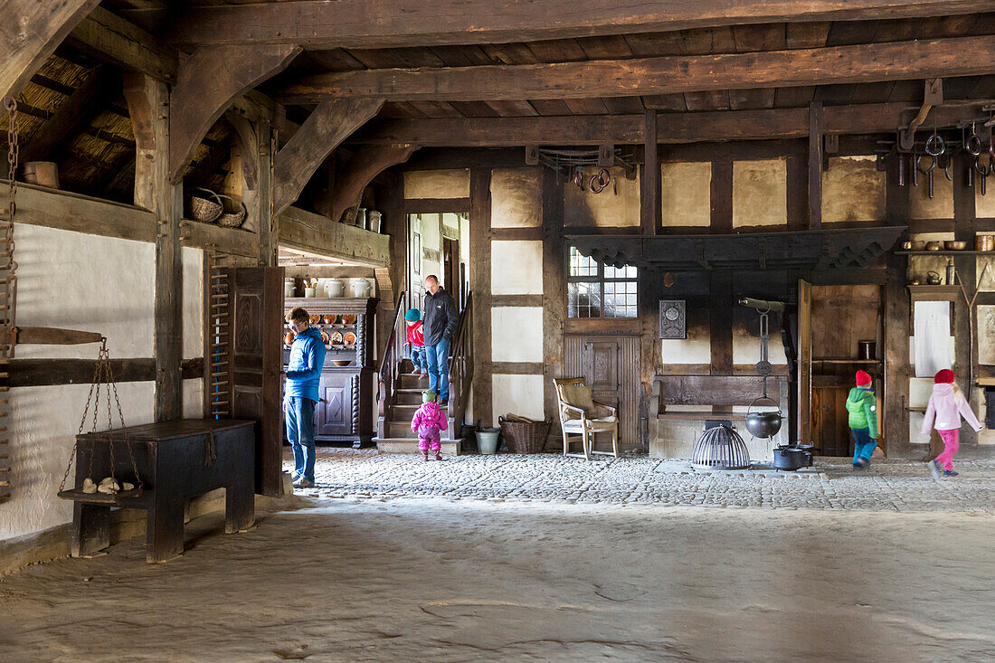 LWL-Open-Air Museum Detmold, visitors in the stable and farmhouse, traditional buildings, frame house, village, Detmold, North Rhine-Westphalia, Germany
