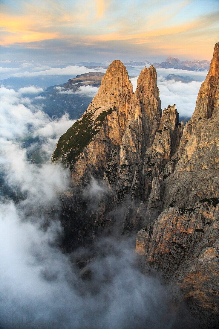 Aerial view of Santner peak at sunset, Sciliar Natural Park, Plateau of Siusi Alp in the Dolomites, Val Funes, Trentino-Alto Adige South Tyrol, Italy, Europe