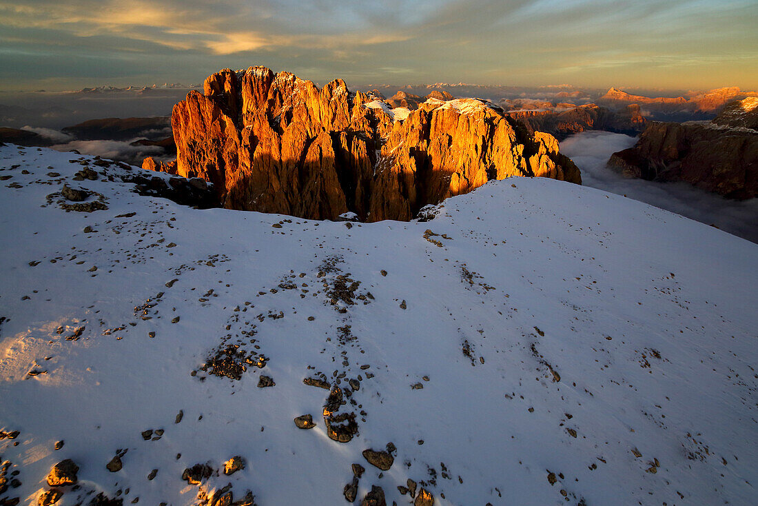 Aerial shot of Sassolungo and Sassopiatto at sunset, Sella Group, Val Gardena in the Dolomites, Val Funes, Trentino-Alto Adige South Tyrol, Italy, Europe
