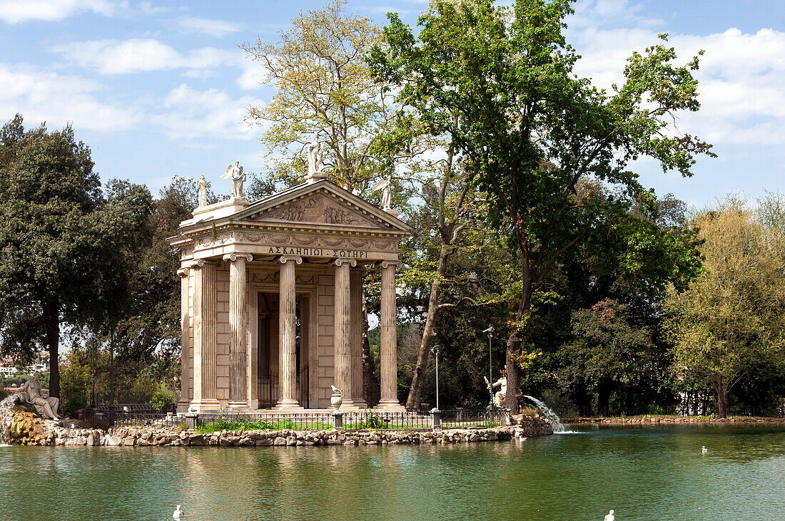 Ionic Temple of Aesculapius, God of Healing, designed by Antonio Asprucci, by an artificial lake in the Borghese Park, Rome, Lazio, Italy, Europe